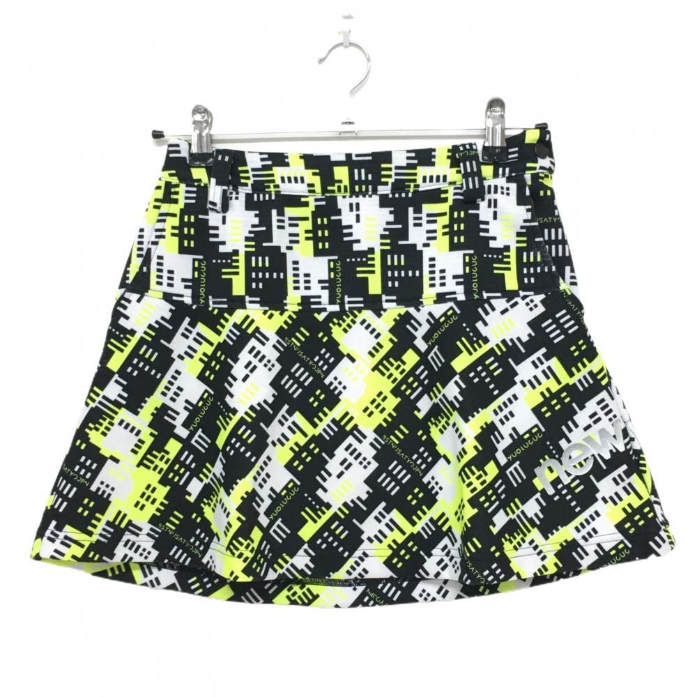 美品】ニューバランスゴルフ スカート 白×黒×蛍光イエロー 総柄 ロゴ