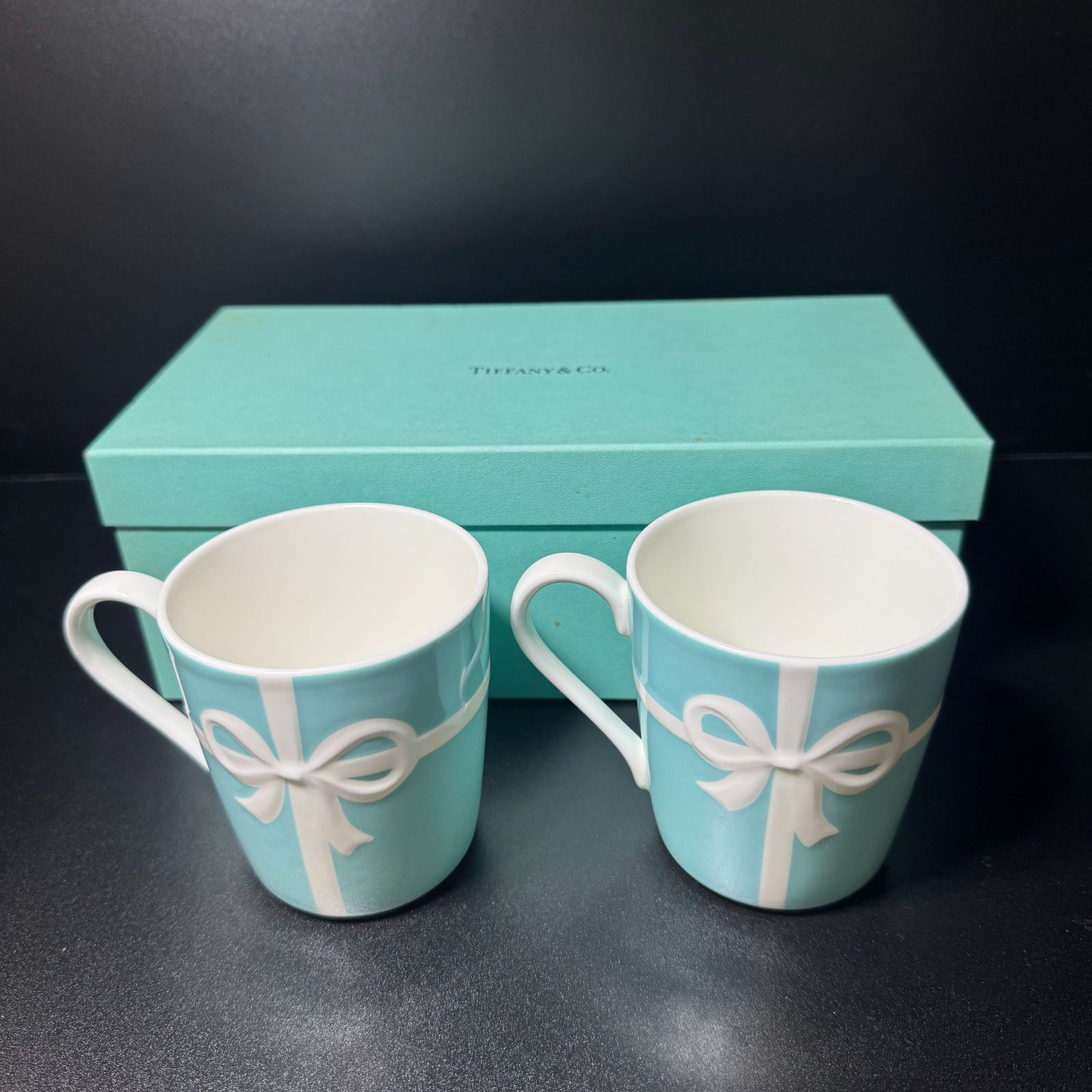 ティファニー ブルーリボンボックスペアマグカップ B25120458 - メルカリ