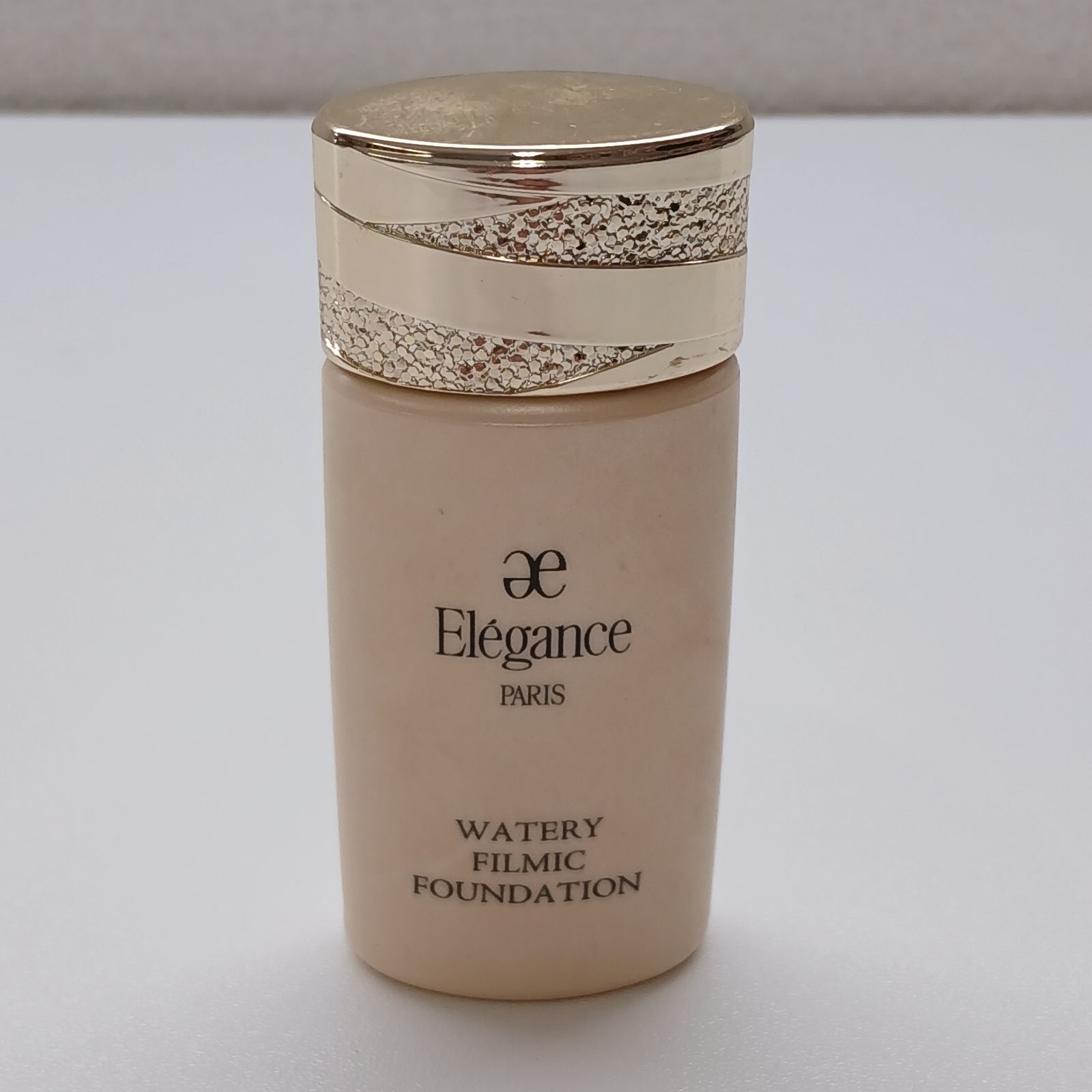 エレガンス ウォータリィ フィルミック ファンデーション NA201 CO