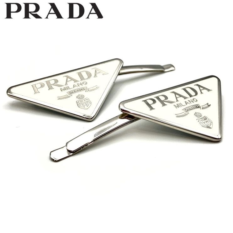 PRADA(プラダ)トライアングル 三角ロゴ ヘアクリップ メタル - メルカリ