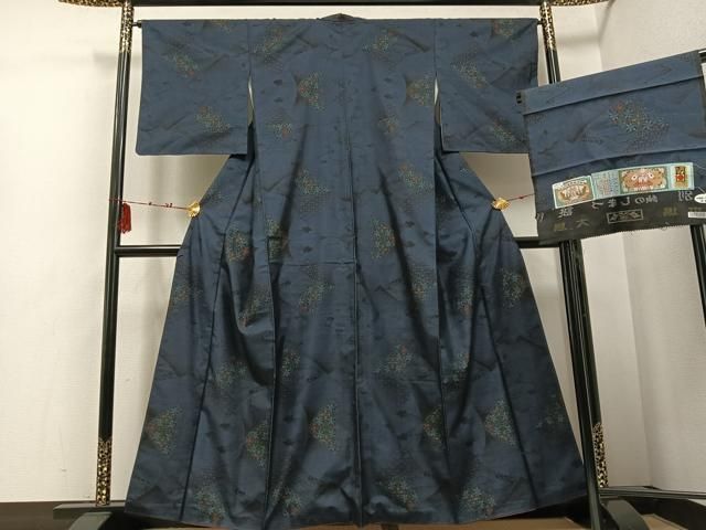 平和屋着物 本場大島紬 古代染色純泥染 カタス7マルキ 流水草花文 島津織物特製 証紙付き 正絹 ph