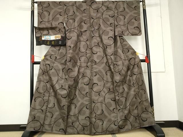 平和屋着物 本場大島紬 一元7マルキ 純泥染 手織 唐草文 竜田朗作 証紙付き 正絹 cs