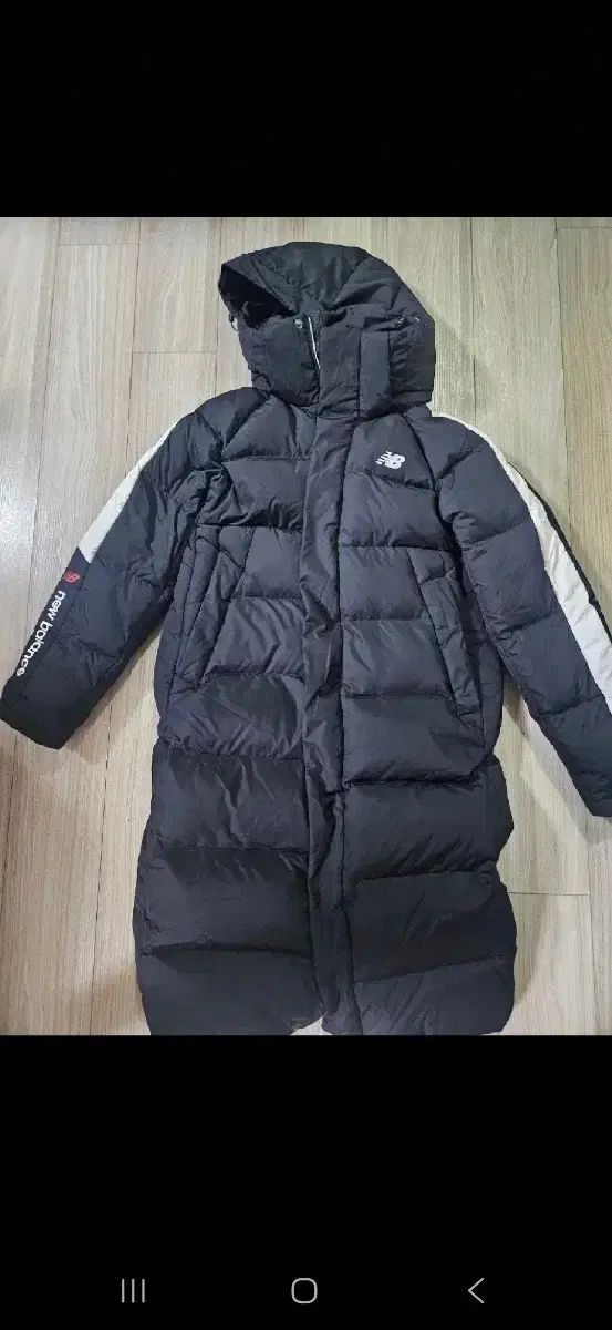 レディース ニューバランス ロングダウンジャケット - メルカリ