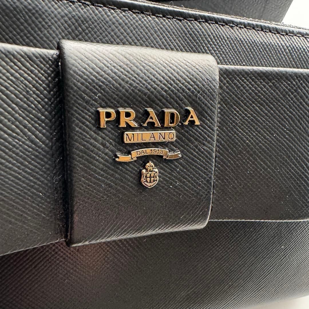 美品】166 PRADA プラダ ラウンドファスナー 長財布 ショップ リボン