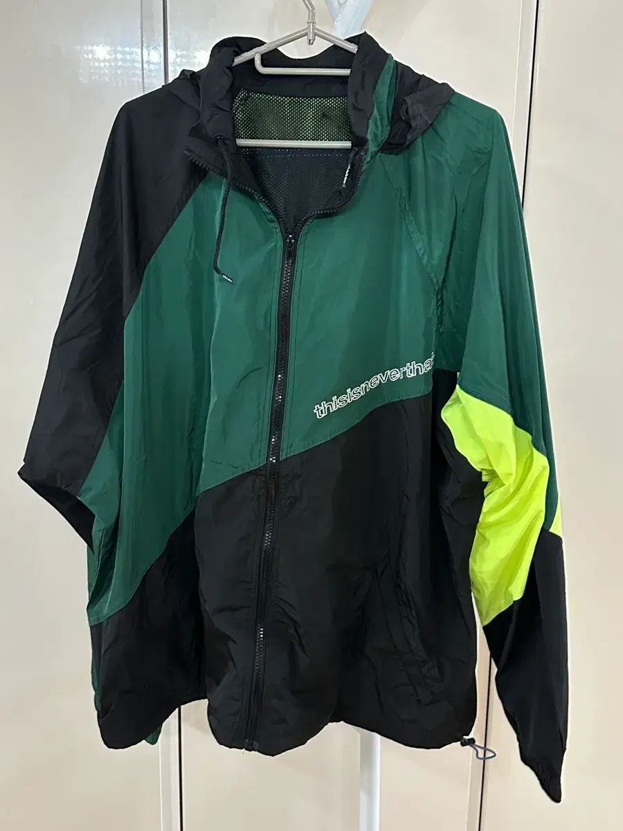 ディスイズネバーザット ウィンドブレーカー カラーブロック グリーン