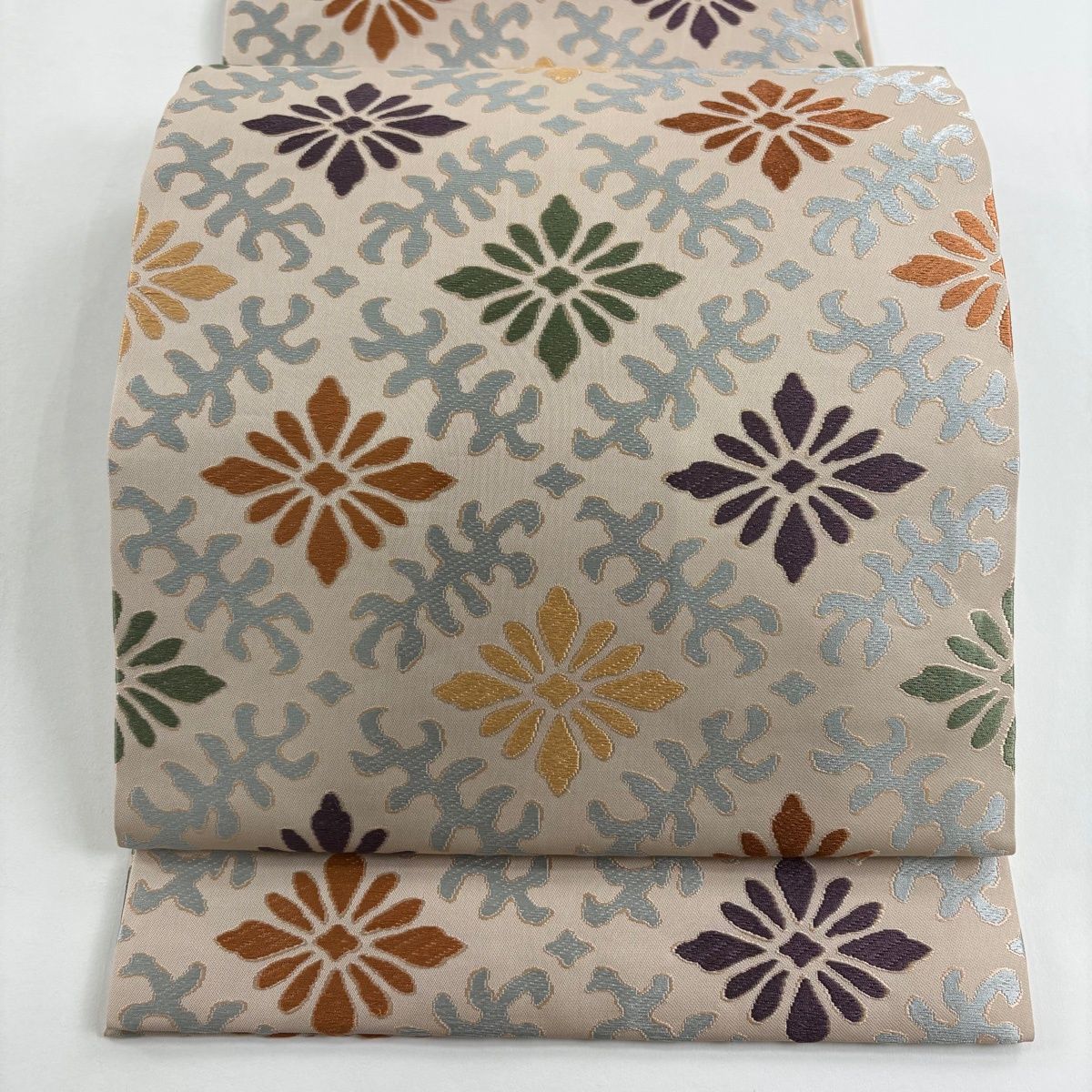 開き名古屋帯 名品 人間国宝 喜多川平朗 落款 花菱 幾何学模様 ピンク