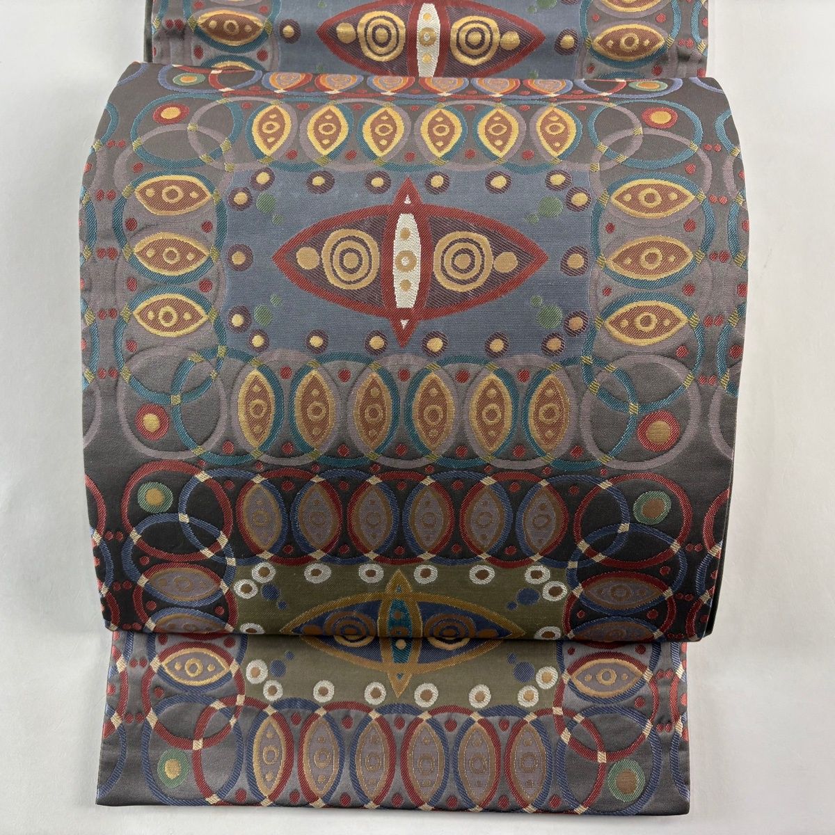袋帯 秀品 丸文 幾何学模様 箔 灰色 六通 正絹