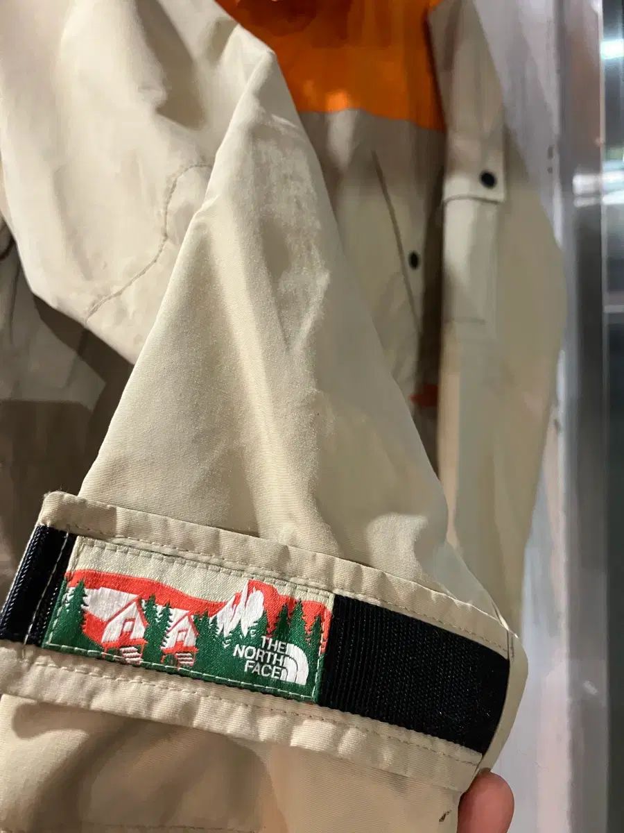 THE NORTH FACE ザノースフェイス オレンジ|ベージュ ウィンドブレーカー