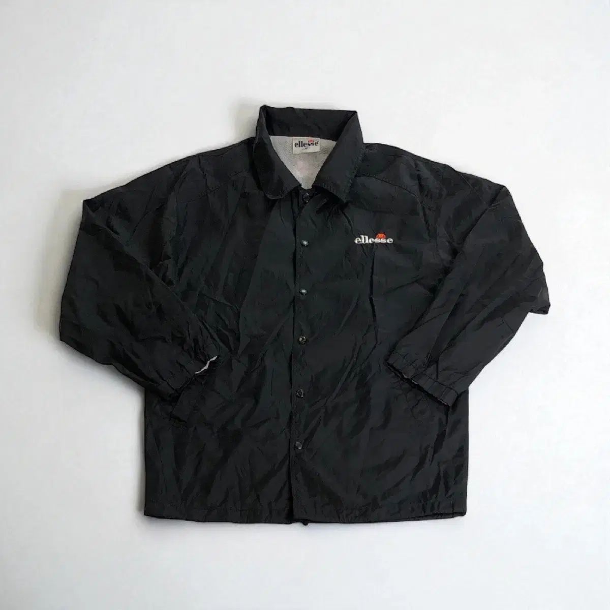 ellesse ブラック COACH ジャケット 実寸 XL - メルカリ