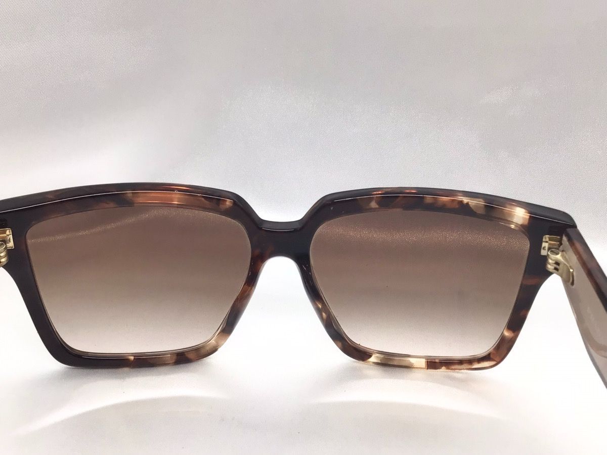  PRADA プラダ サングラス SPR 24 Z-F 57 14 07 R-OA 6 140 2 N M-1724 サングラス 小物