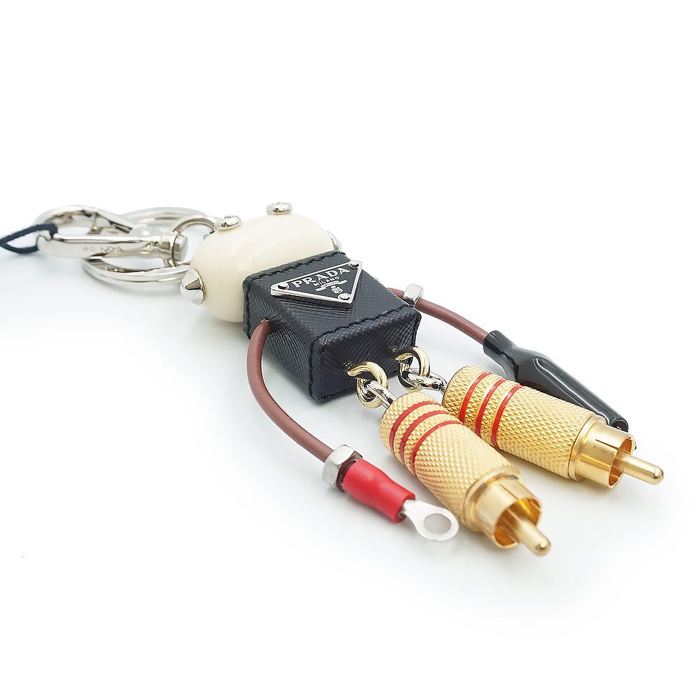 プラダ トリック ロボット エドワード トライアングル 三角ロゴ