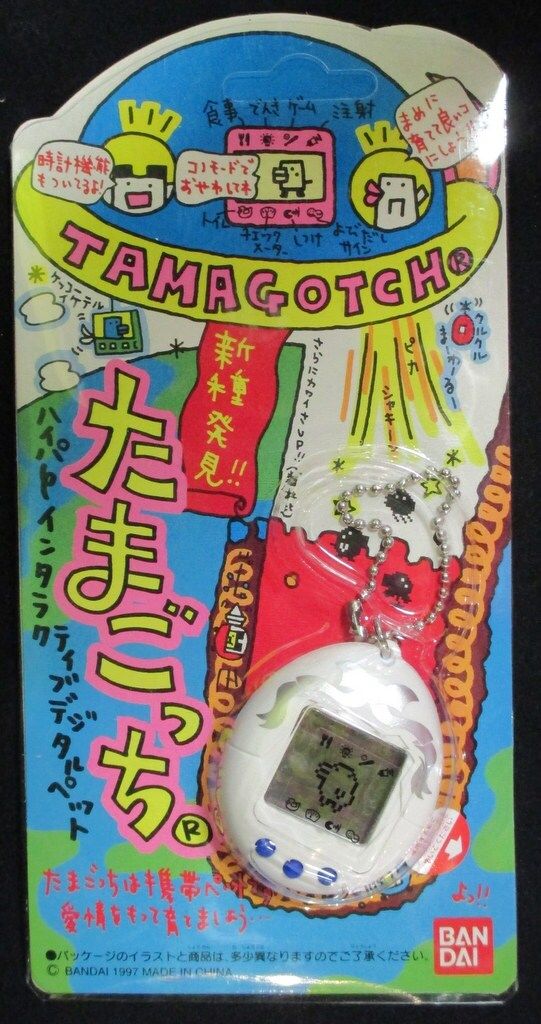 バンダイ 新種発見!!たまごっち 株主優待 白ボディ 銀リボン柄 青ボタン