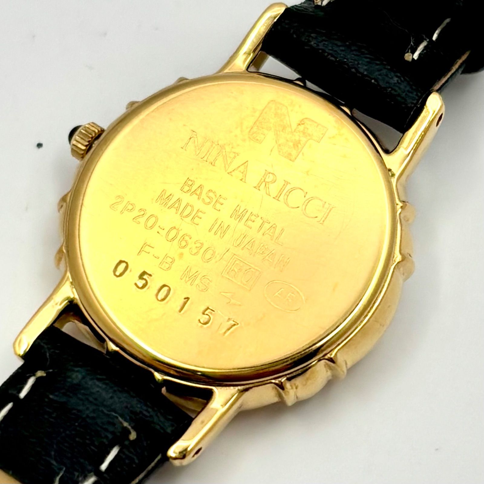 美品/新品電池】NINA RICCI ニナリッチ 7Pダイヤ シェル レディース