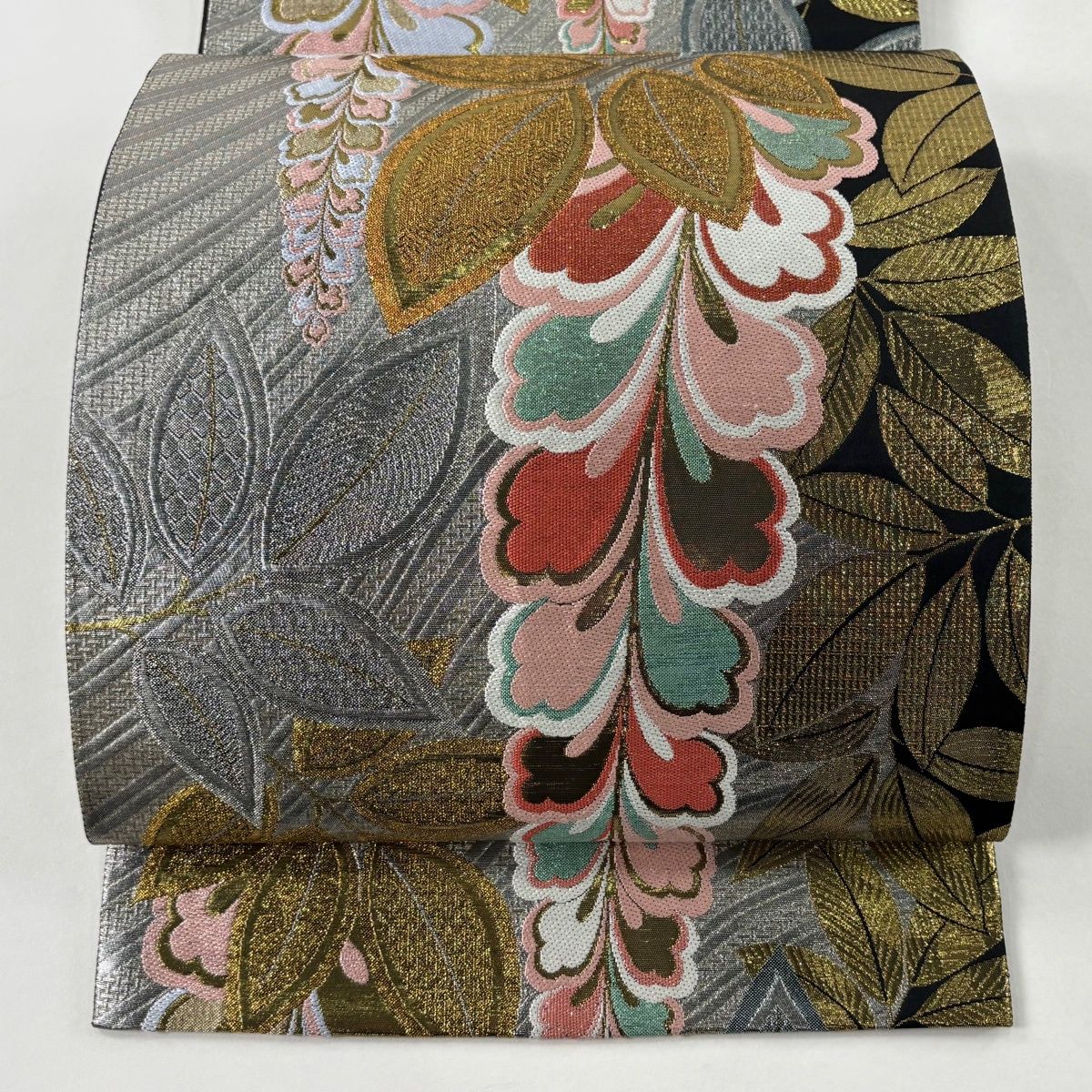 袋帯 秀品 振袖向き 藤 葉柄 箔 銀色 全通 正絹