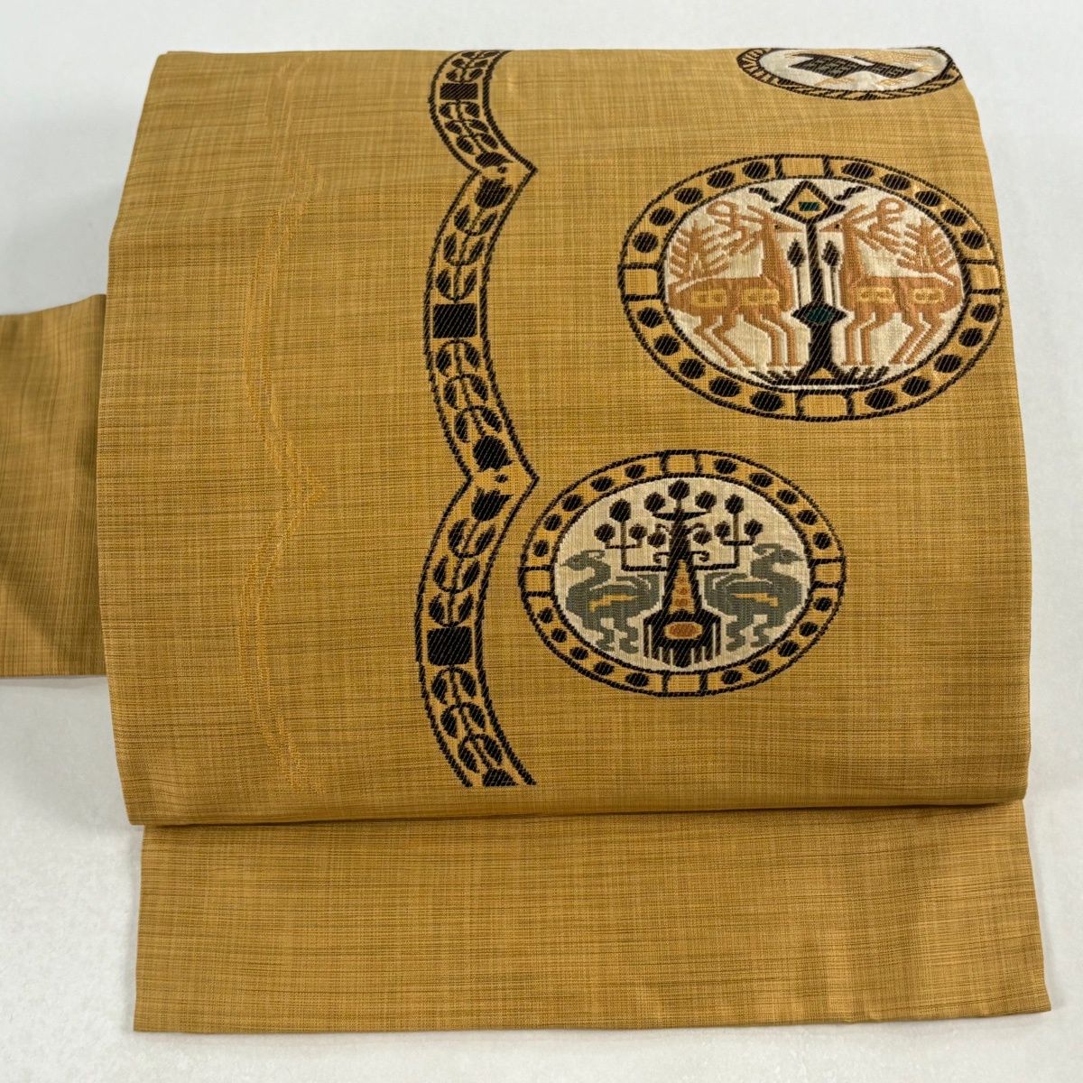 名古屋帯 秀品 紬地 動物 丸紋 山吹色 正絹