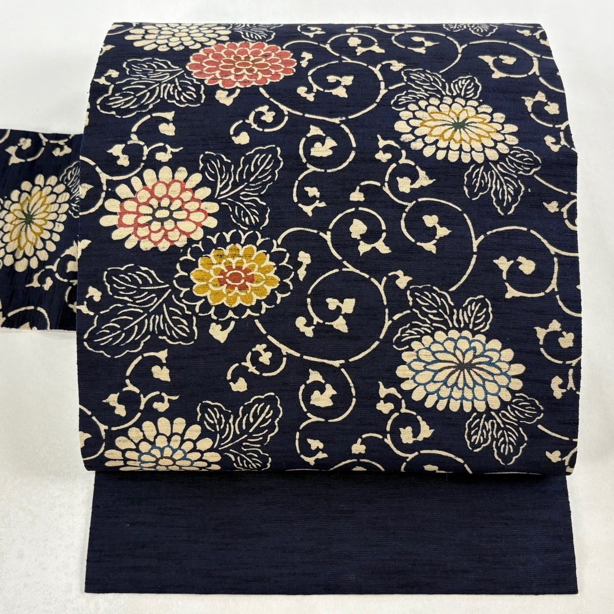 名古屋帯 秀品 紬地 草木染 菊唐草 濃紺 正絹