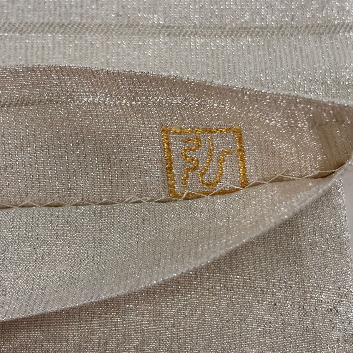 袋帯 逸品 桝屋高尾 落款 ねん金綴錦 段霞文 箔 銀色 全通 正絹 【中古