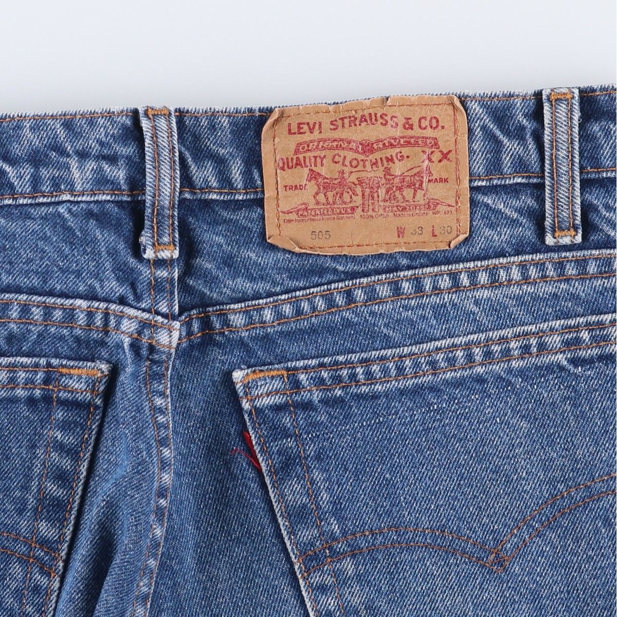 テーパードデニムパンツ