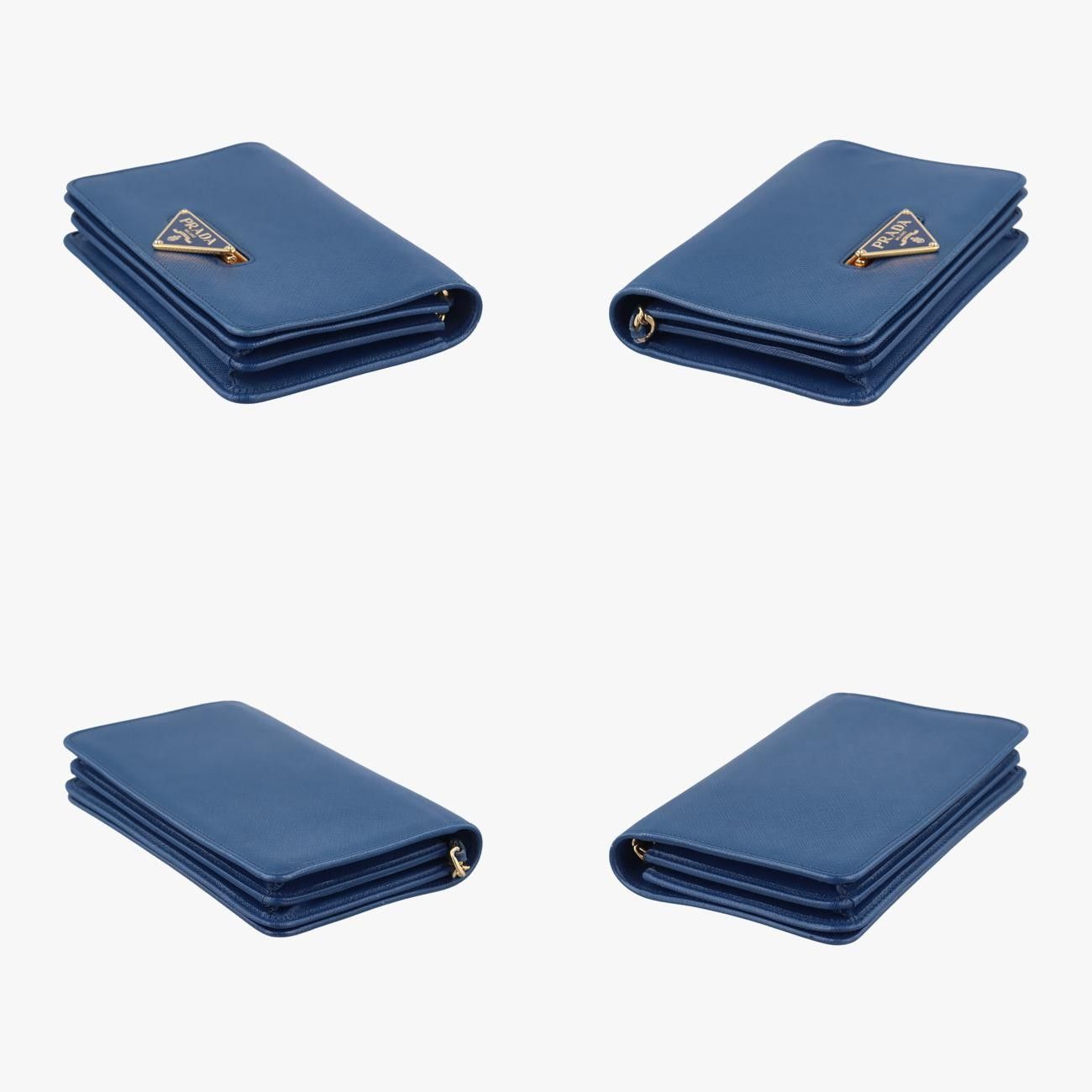 現行 美品✨プラダ ケース エンボス 三角ロゴ サフィアーノレザー ブルー PRADA 二つ折り財布 美品 青 レザー 美品】PRADA 二つ折り財布 三角