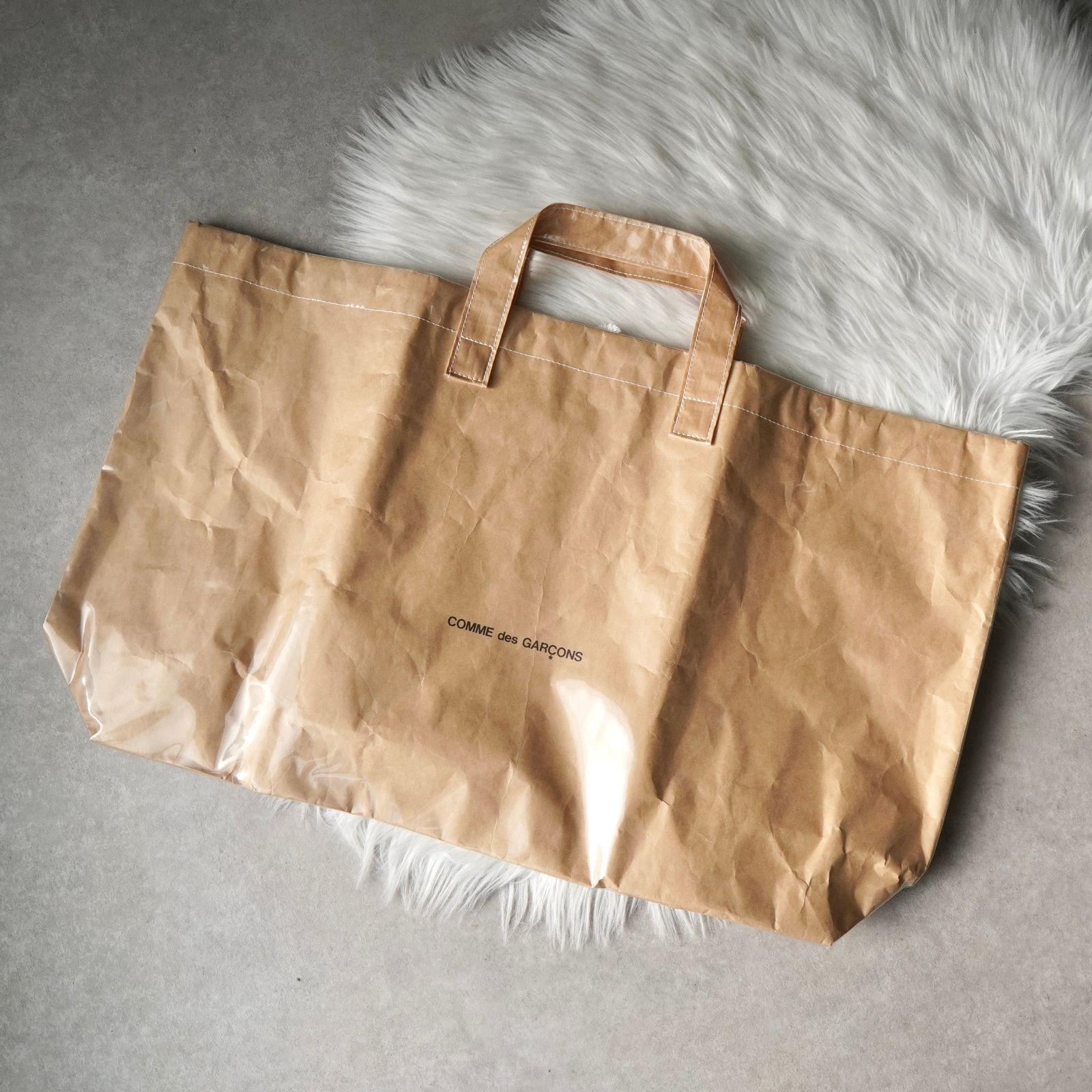 プレイ コムデギャルソン ロゴ PVC ショッパー トートバッグ ベージュ