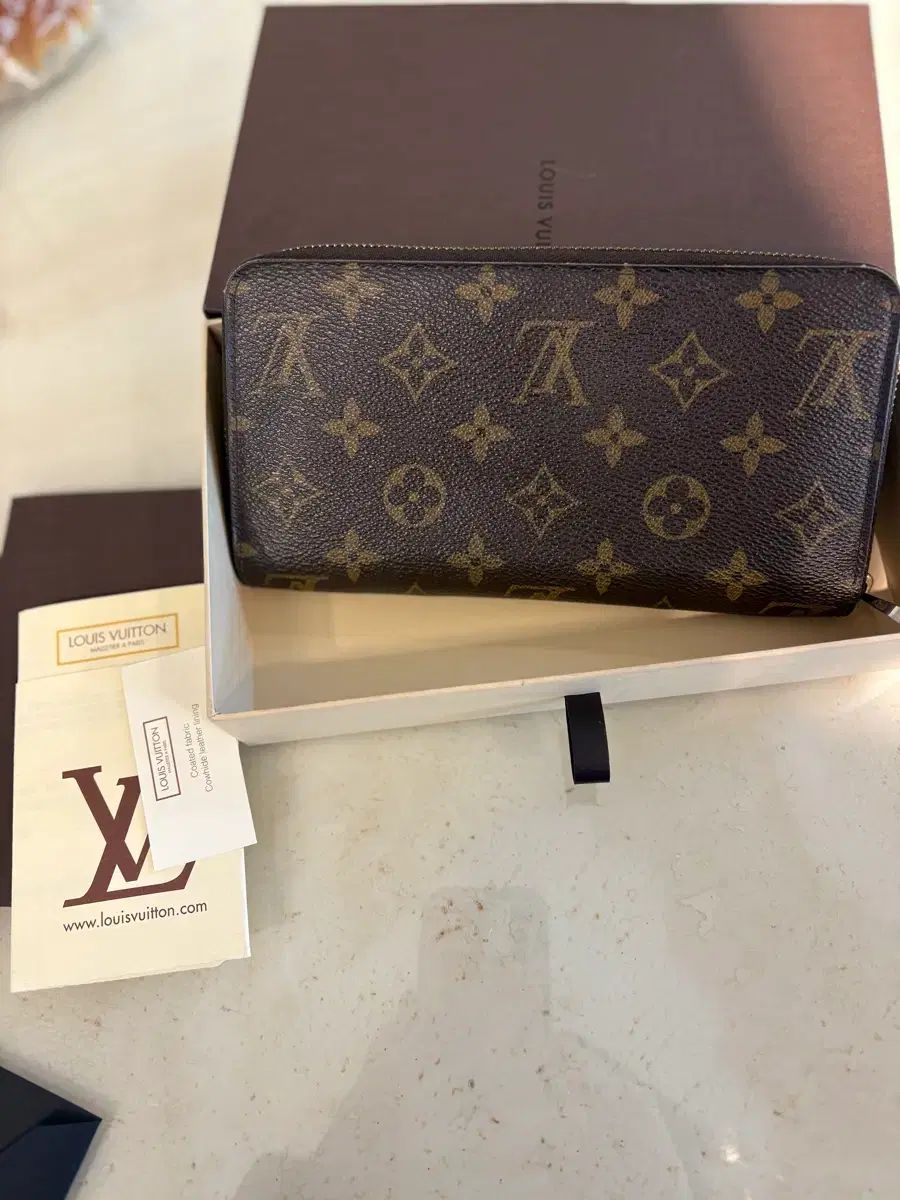 ルイヴィトン ジッパー ドール 財布 デパート