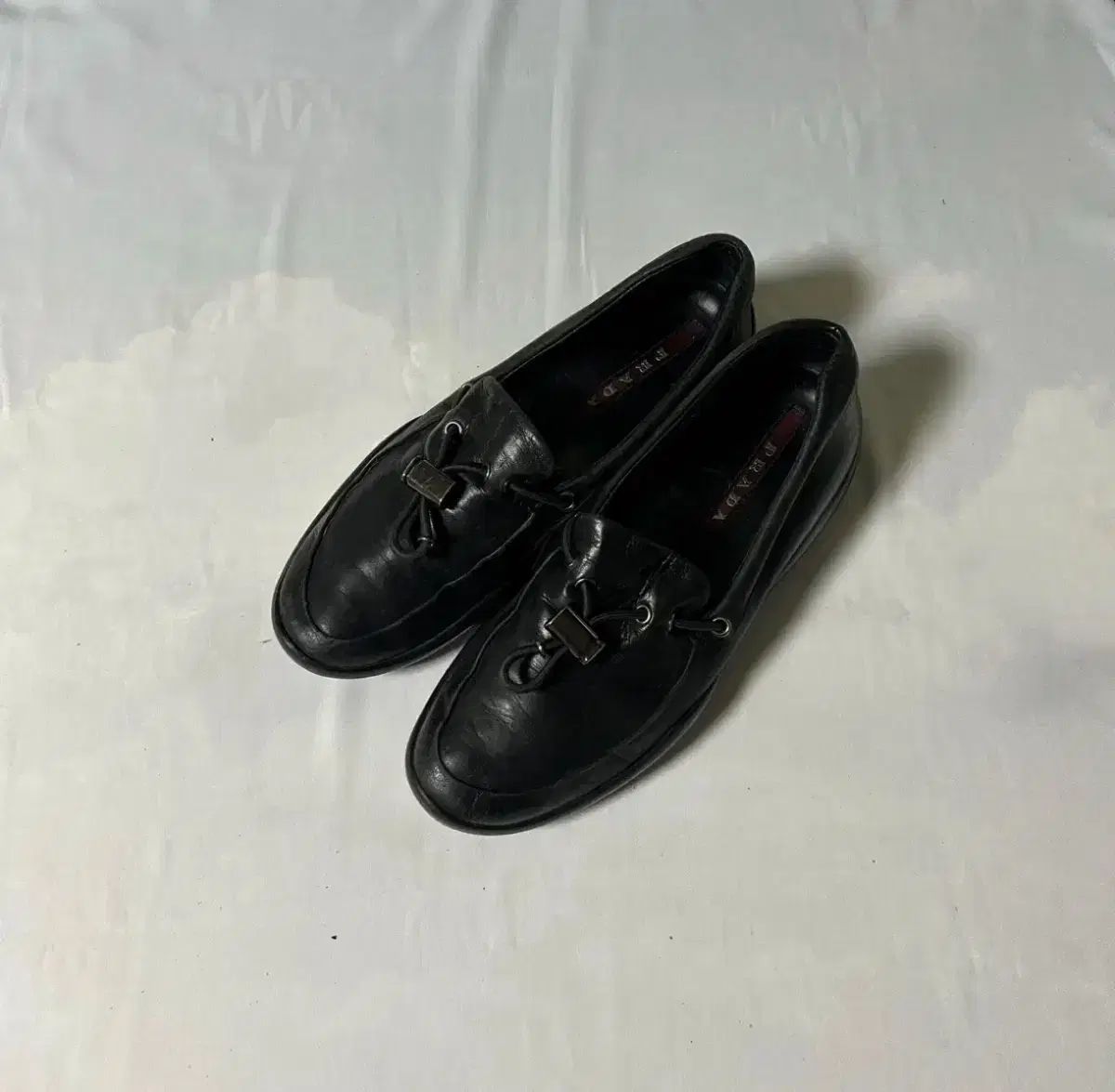 prada nappa toggle slipon loafers