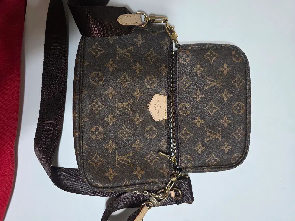 ルイヴィトン マルチ ポシェット アクセソワール モノグラム ブラウン コインケース紛失