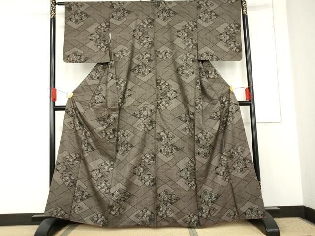 平和屋着物 本場大島紬 一元7マルキ 泥染め 花菱文 正絹 cs