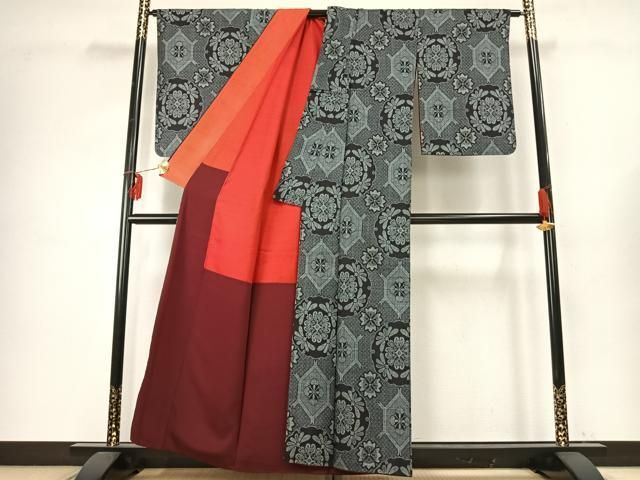 平和屋着物 本場大島紬 割り込み絣 雪輪花文 正絹 fy