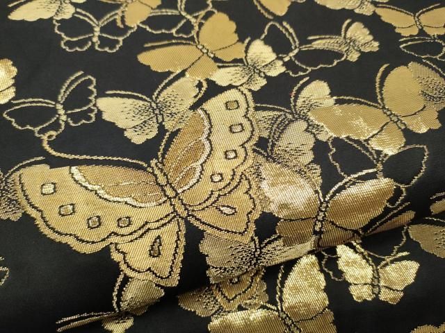 六通柄袋帯 舞蝶文