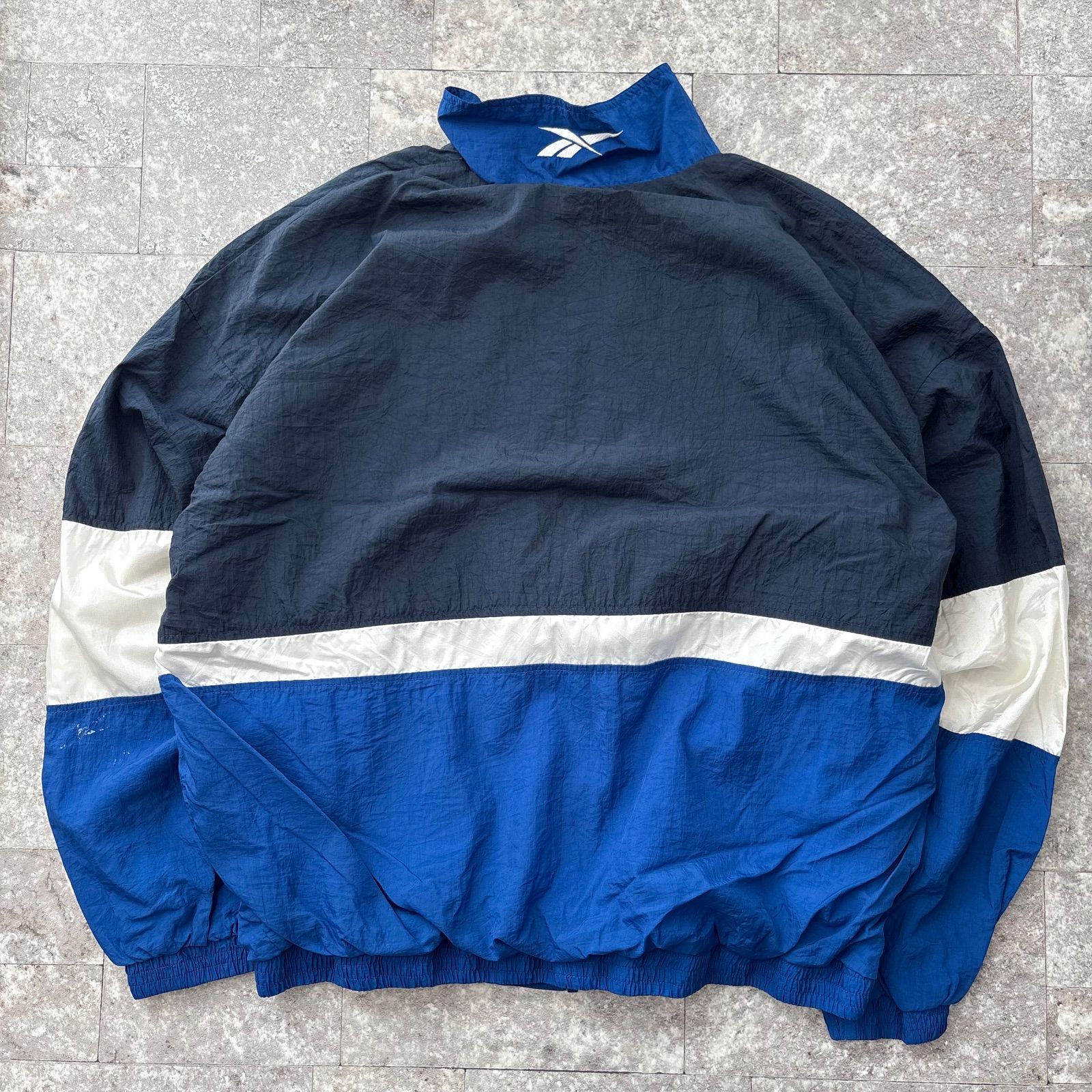 90's Reebok リーボック USA古着 ナイロンジャケット 刺繍ロゴ 90's Reebok リーボック 刺繍ワンポイント ベクターロゴ ブラック