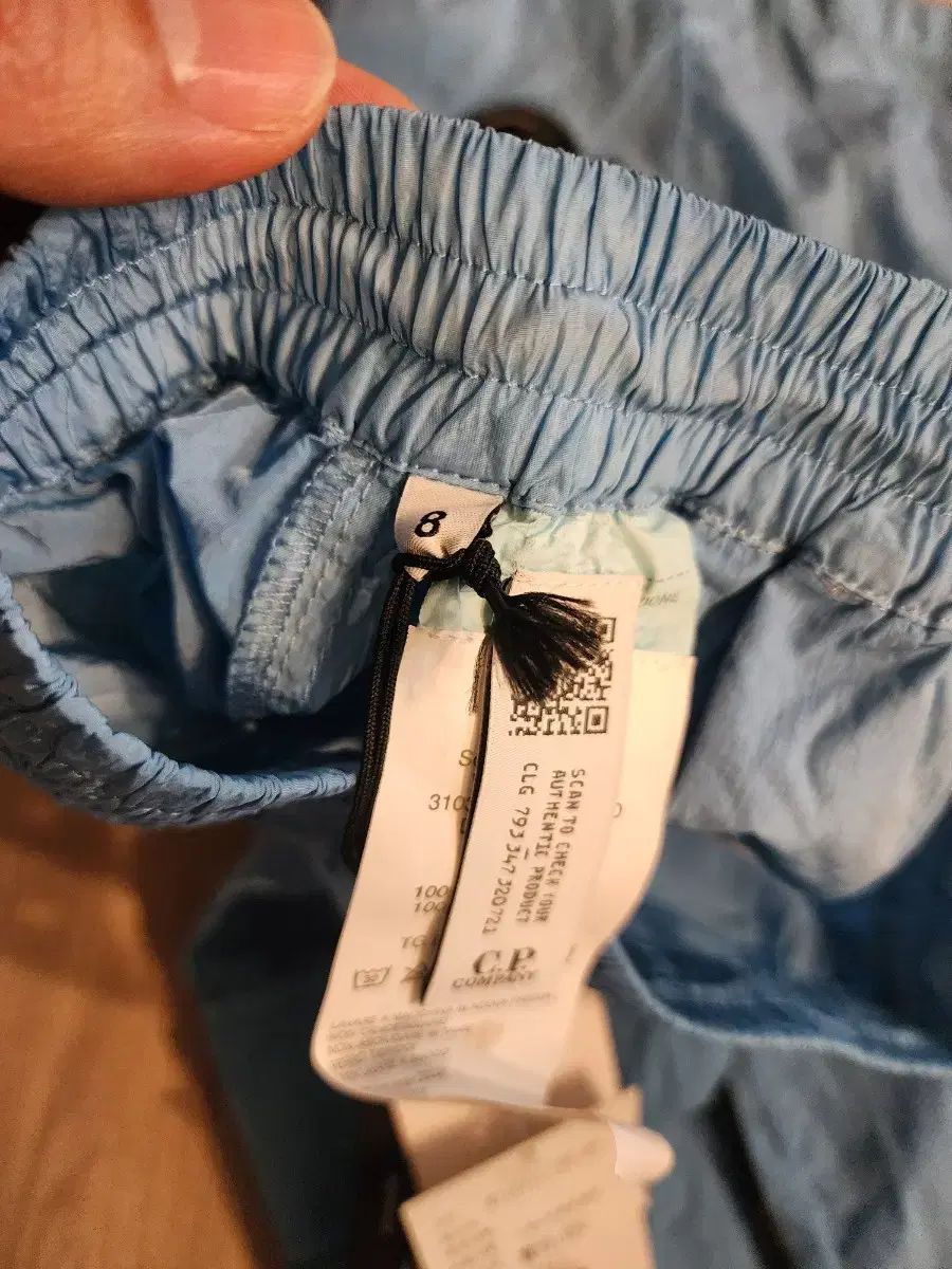 C P カンパニー キッズ ブルー ポケット ハーフパンツ