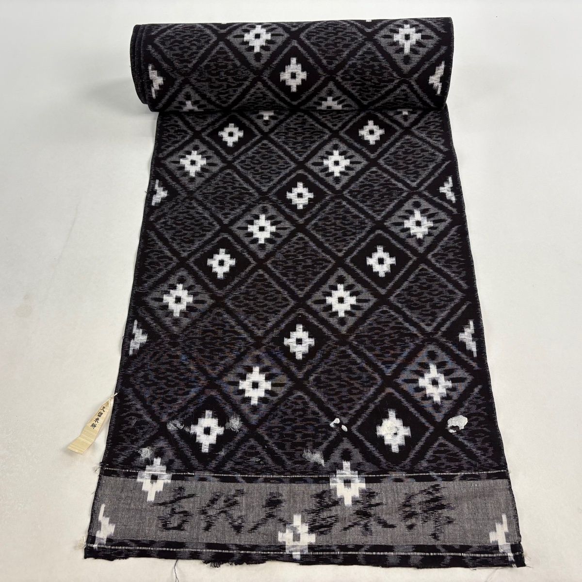 反物 紬 久留米絣 菱 幾何学模様 焦茶色 綿