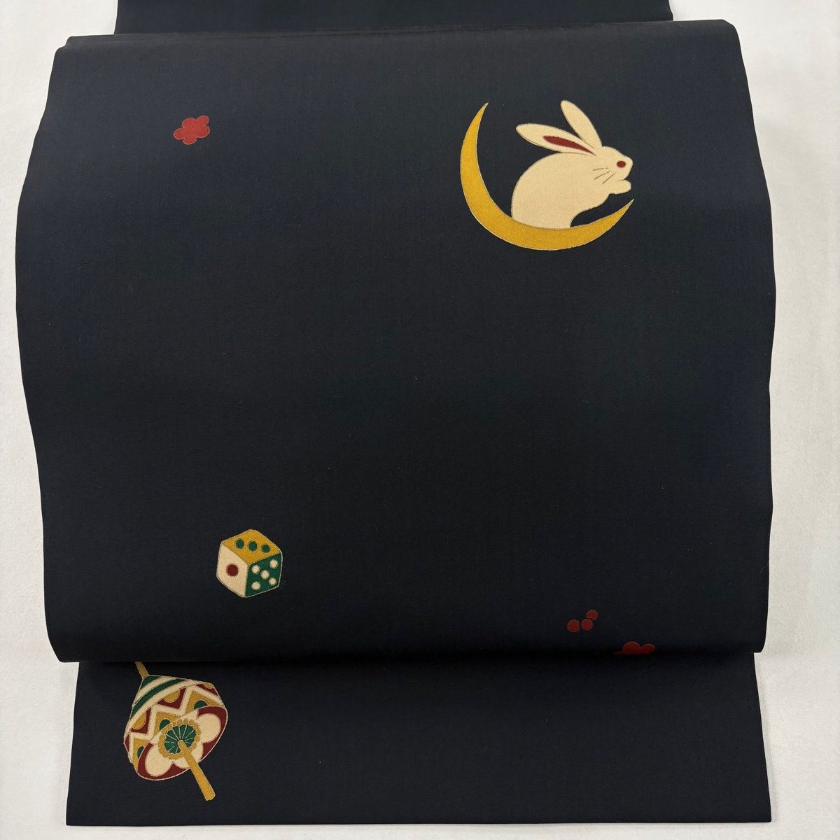 開き名古屋帯 秀品 松葉仕立て うさぎ 玩具 金彩 黒 正絹