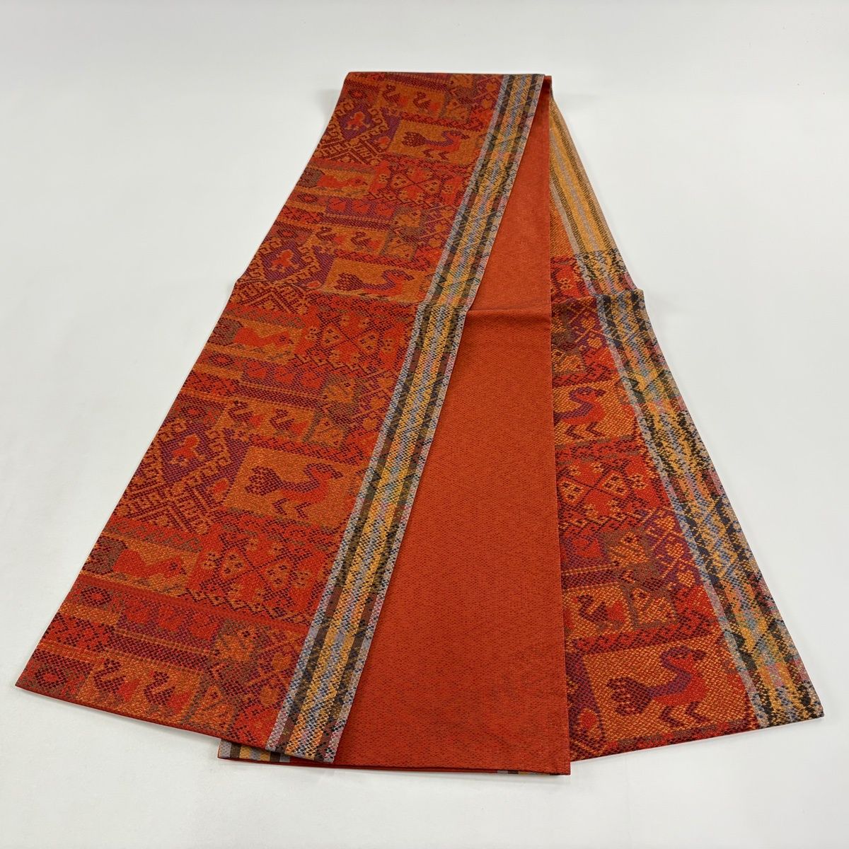 袋帯 秀品 紬地 手蜘蛛絞り 茜色 全通 正絹 【中古】