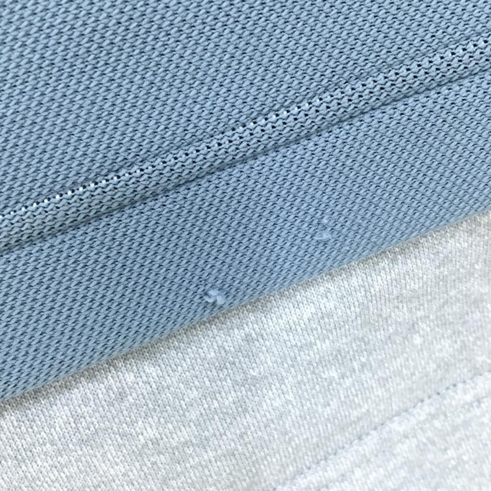 マークアンドロナ 異素材ニットベスト グレー系×黒×蛍光オレンジ