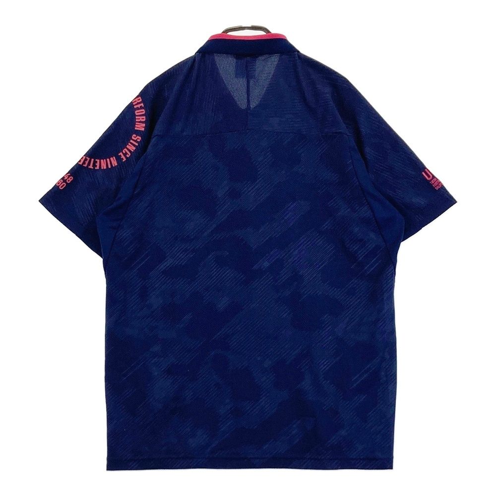 サイズ：L OAKLEY オークリー 2023年モデル FOA406436 ロゴ刺繍入り 半袖ポロシャツ 総柄 ネイビー系 [240101584283] ゴルフウェア メンズ ストスト