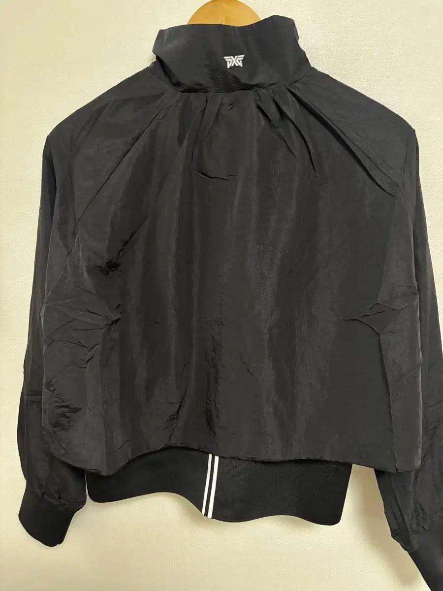 PXG レディース ブラック クロップド ウィンドブレーカー ジャケット