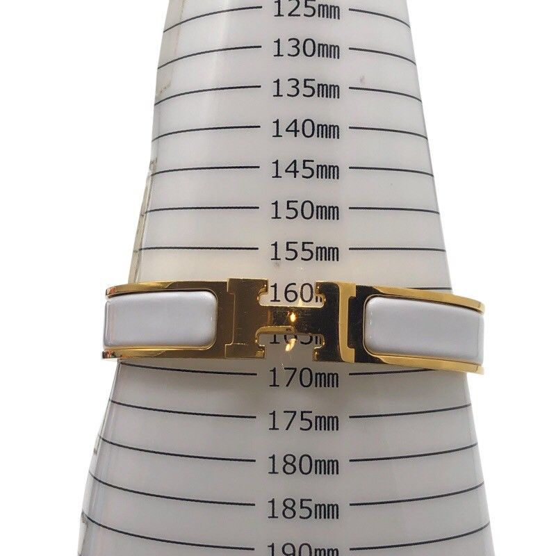  エルメス HERMES クリッククラックPM ホワイト GD エナメル メタル その他 アクセサリー