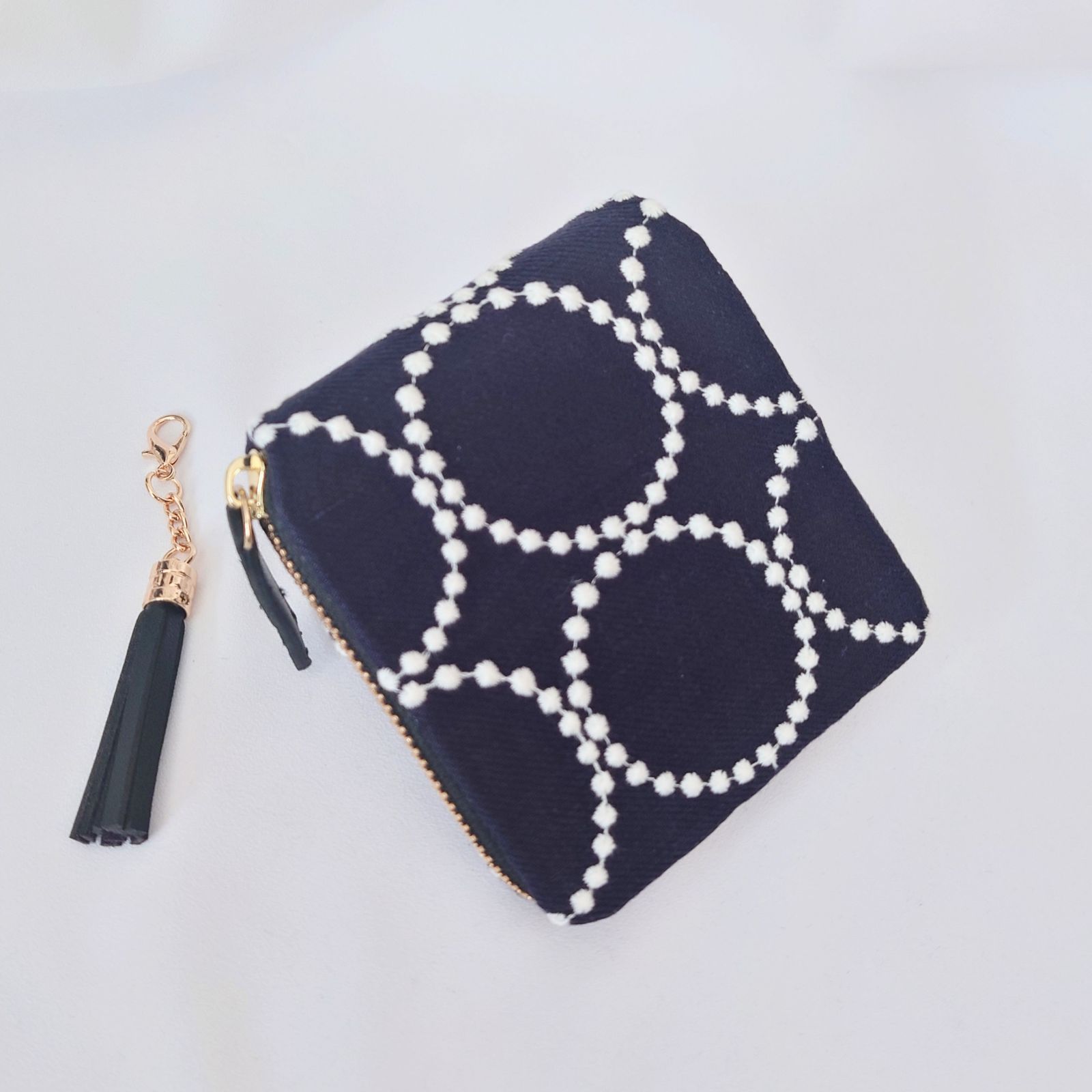 タンバリン タッセル付き二つ折り財布