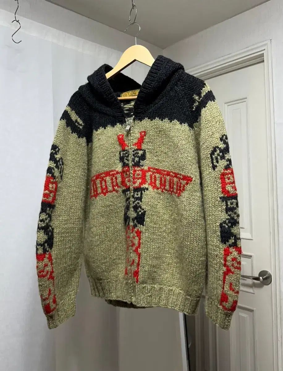 RNA ウール カウチン ニット フード ジップアップ