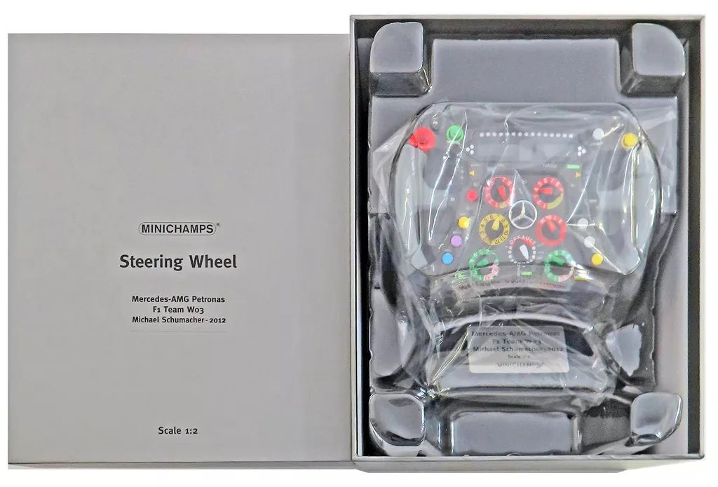ミニカー 1 2 シテアリングホイール メルセデス AMG ペトロナス F チーム W 03 ミハエル シューマッハ 2012