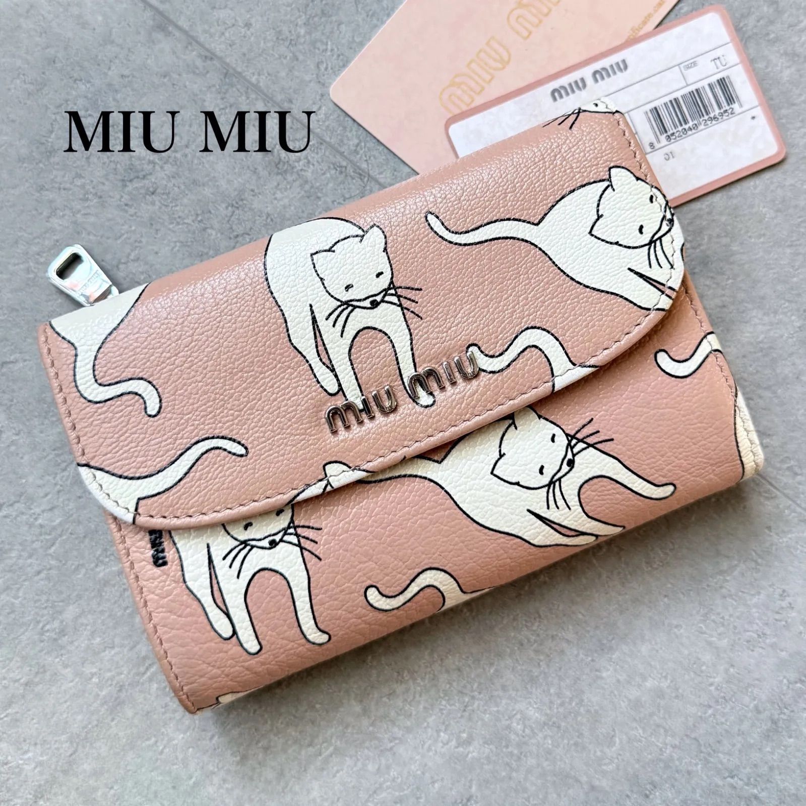 MIU MIU 二つ折り財布 ねこ 希少】miu miu ミュウミュウ 二つ折り財布 レザー 猫 - メルカリ