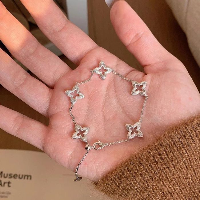 フラワー 花モチーフ 十字型 シルバー ブレスレット レディース