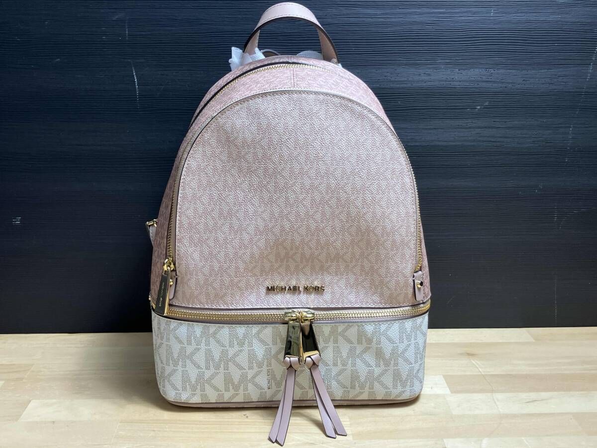 MICHAEL KORS マイケル コース リアジップバックパックミディアム MKシグネチャー レディース 総柄 ピンク×ホワイト