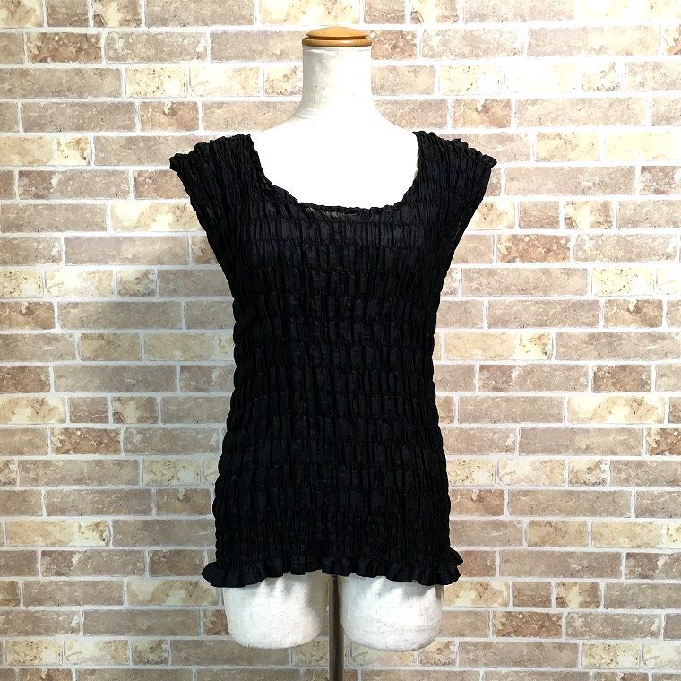 イッセイミヤケのトップス｛未使用） イッセイ ミヤケ新作、アシンメトリーなニットワンピース＆しなやか