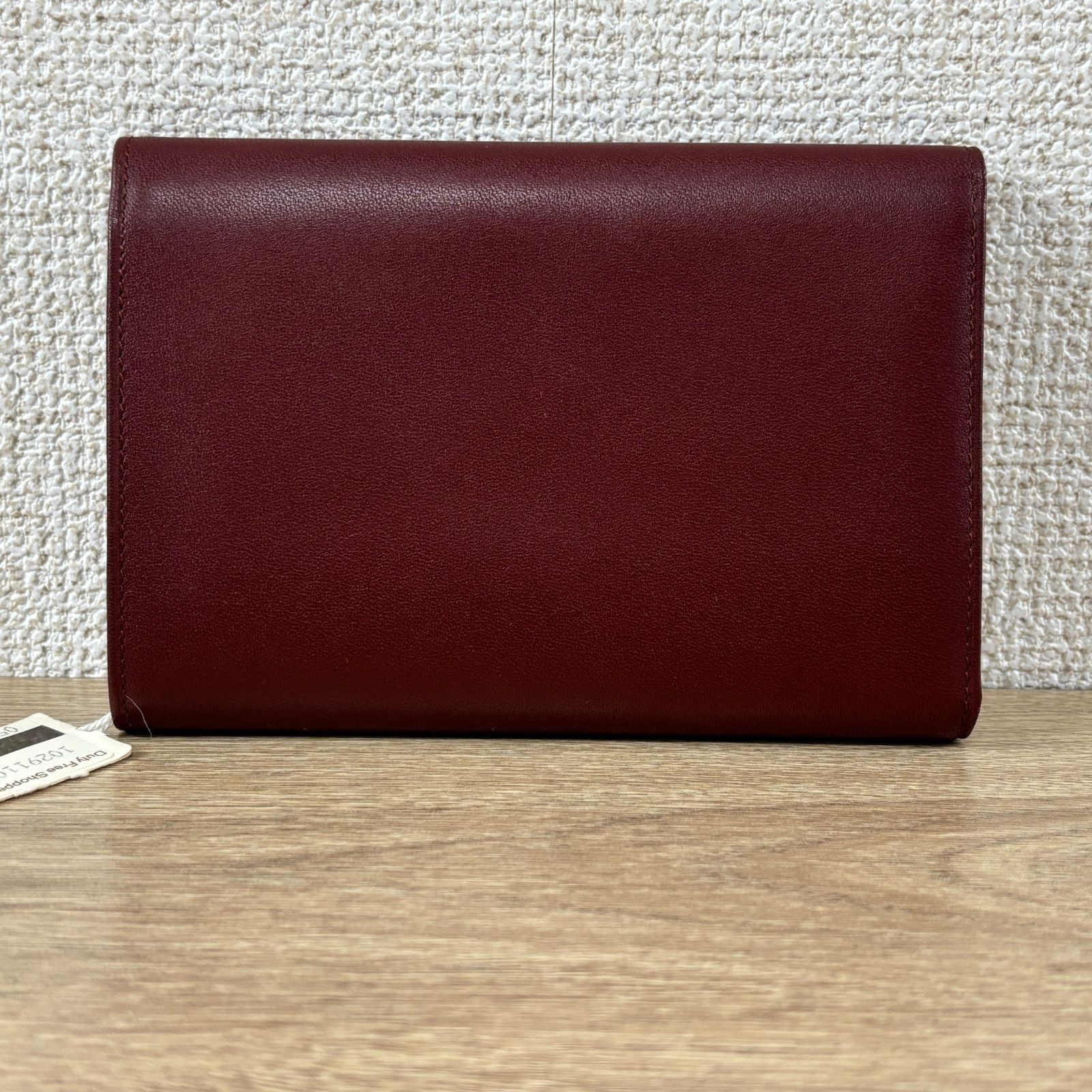 Cartier カルティエ マストライン 小銭入れ がま口 三つ折り財布 ボルドー レザー ロゴ刻印 ゴールド金具 レディース メンズ き