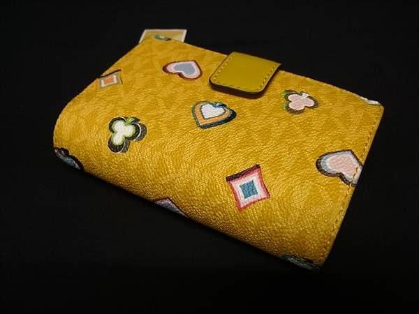 MICHAEL KORS マイケルコース JET SET TRAVEL MK柄 PVC 二つ折り 財布 ウォレット イエロー系 BP 6422