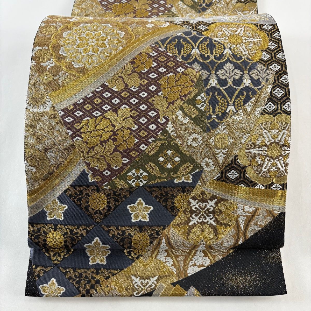 袋帯 秀品 振袖向き 華文 草花 金銀糸 箔 黒 六通 正絹