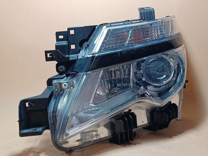 コーティング済 エルグランド TNE52 左ヘッドランプ・ヘッドライト 250